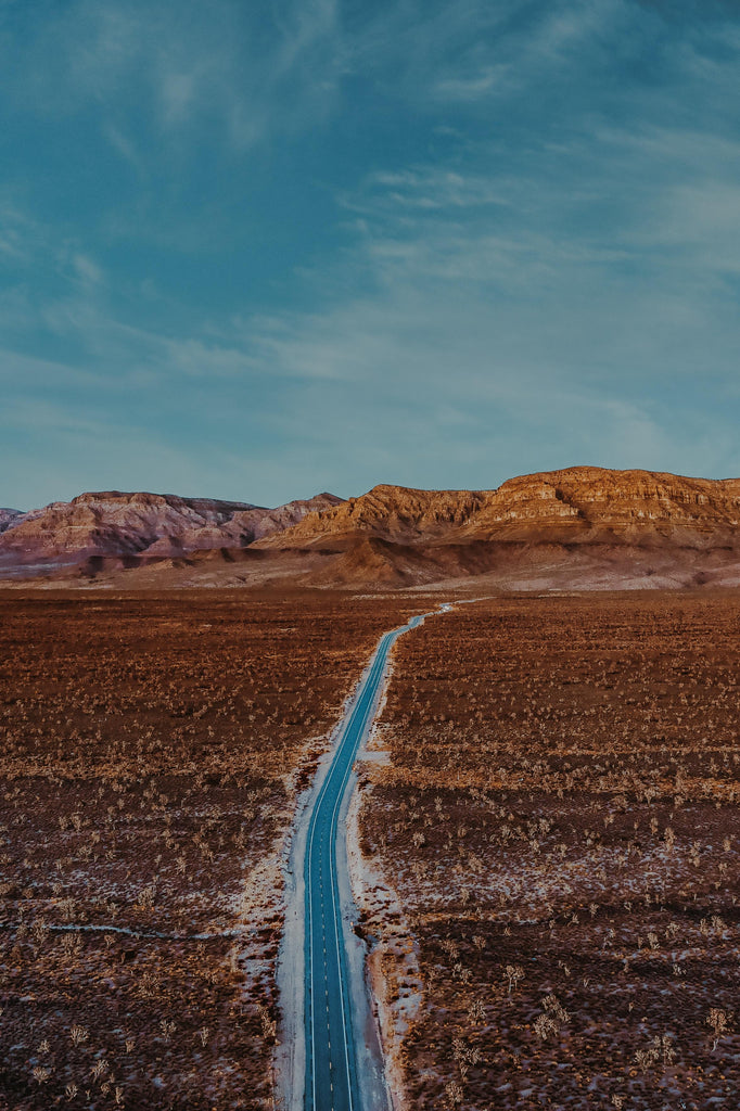 Aerial Photo of paved road through desert