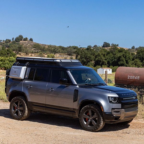 Defender with Convoy Tent closed side view